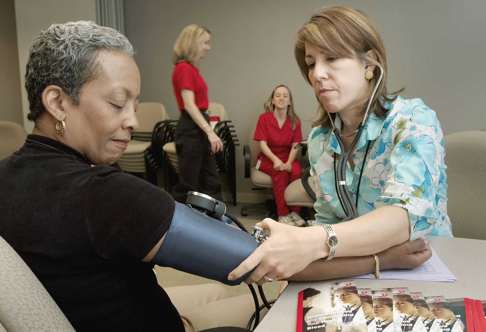 Provider examining a patient during a sick visit